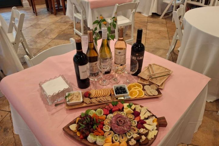 a dining table with a cake