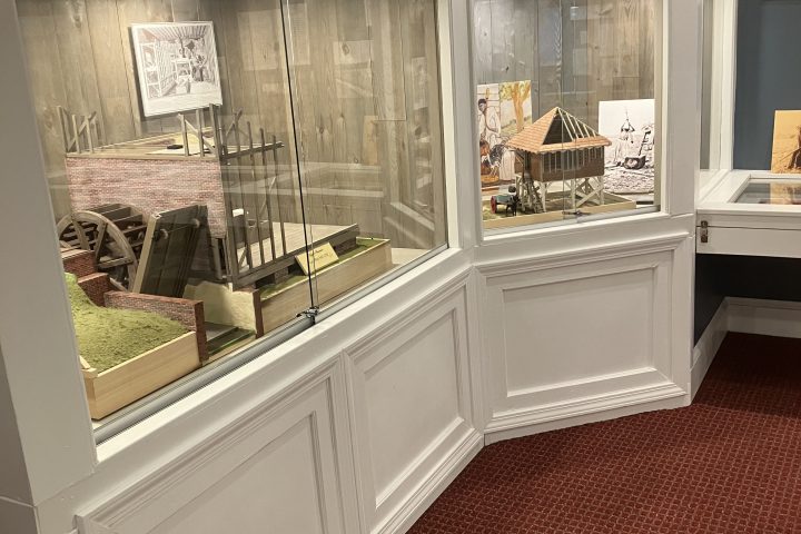 a room filled with furniture and a fireplace