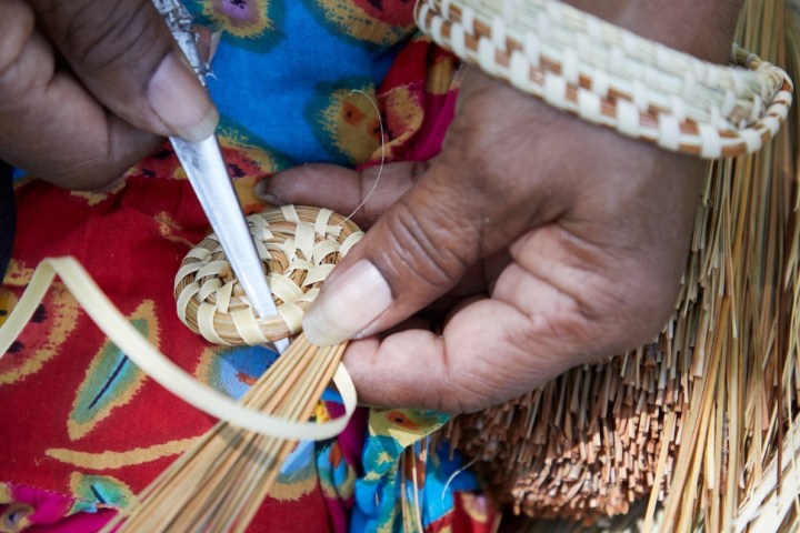 a person holding a baby