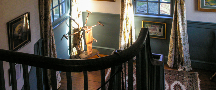 a chair sitting in front of a window