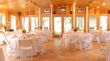 a dining room table in front of a window