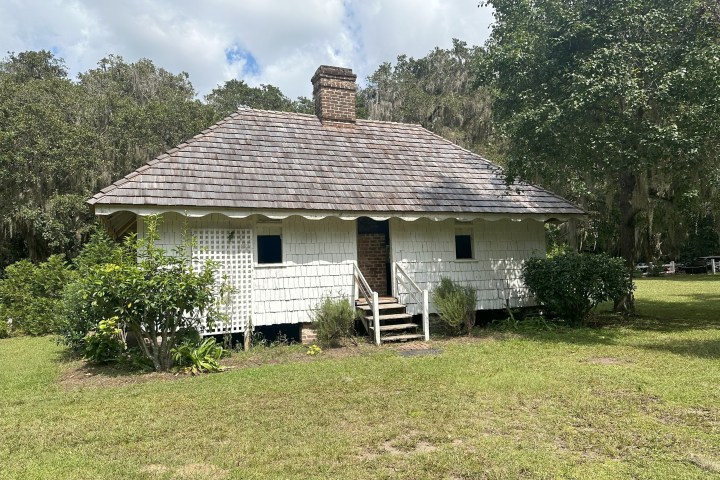 a house in the middle of a field