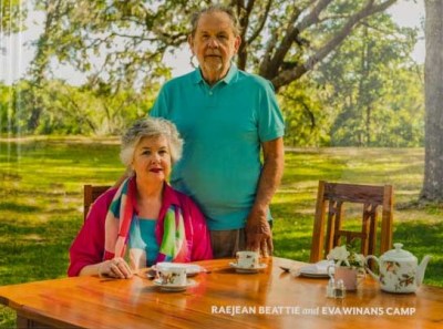 THE BEATTIES a man sitting at a table